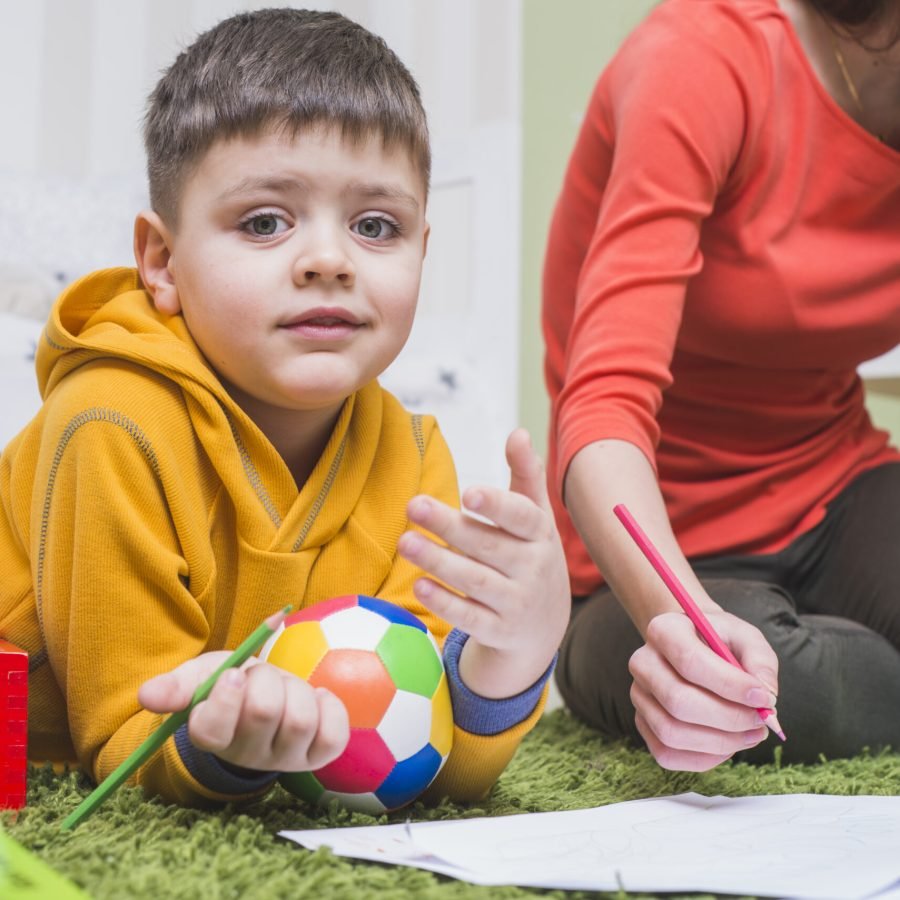 boy-drawing-pencils